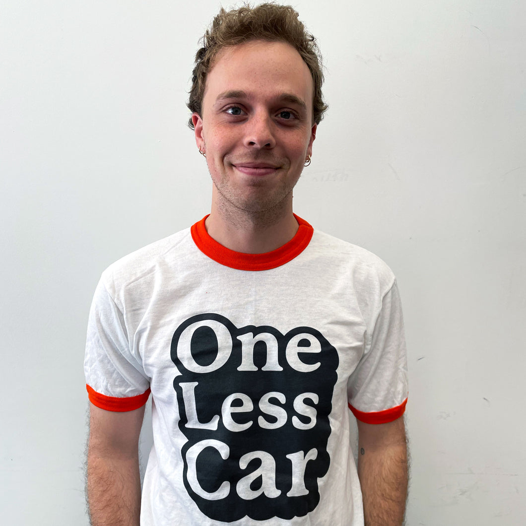 'One Less Car' Ringer Tee